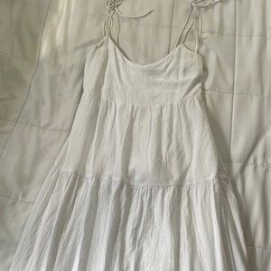 Long white very airy dress.